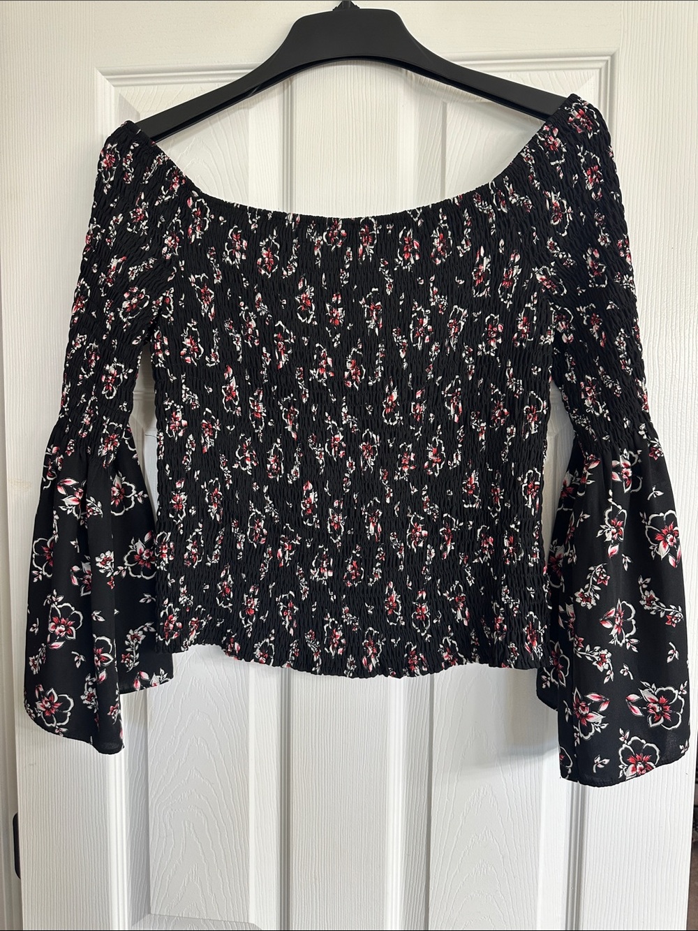 Express Black Off-Shoulder Smocked Floral Blouse with Pink Accents